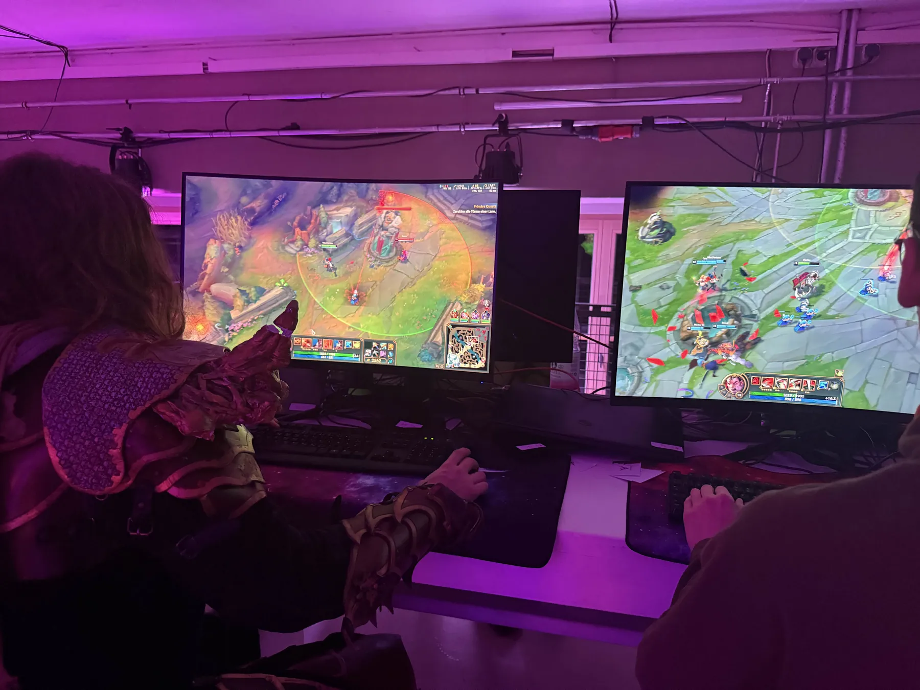 Players at the LAN area under purple light